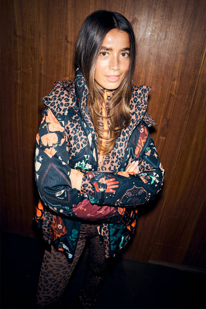Night Garden Ski Jacket featuring leopard, poppy and mystical motifs, with a funnel neck and hood.