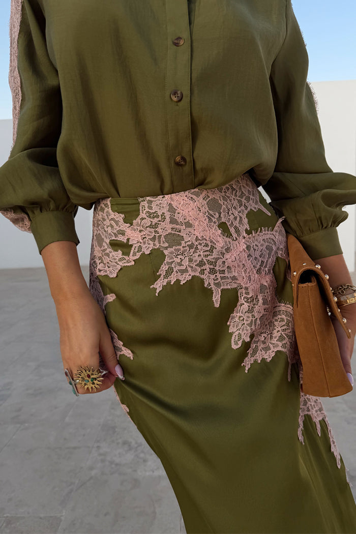 Olive & Pink Lily Skirt in olive green satin with pink lace detailing, styled with a matching olive shirt.