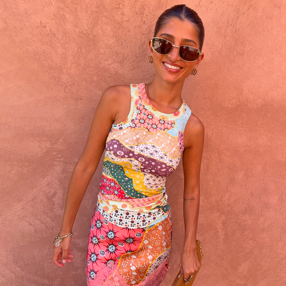 Pastel Morocco Rib Tank Top with abstract sun and eye motifs in a soft ribbed fabric, styled on a model outdoors.