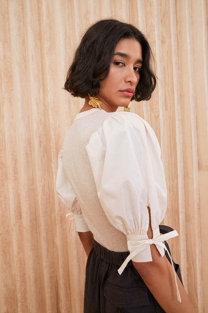 Oatmeal Designer Puff Sleeve Cotton Top - Back View with Tie Cuff Detail | Ulla Johnson