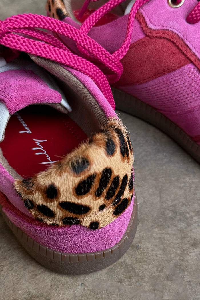 Pink and Red Leather Trainer detail featuring a leopard print heel tab and soft pink suede upper.