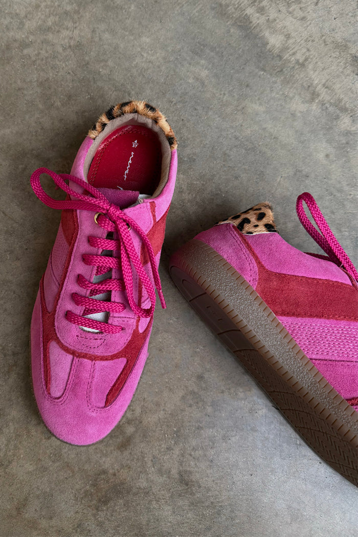 Pink and red trainers with a soft suede finish, leopard print heel tab and matching pink laces.