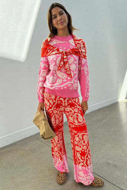 Pink and red bandana print Copenhagen Jumper with a matching necktie, styled as a co-ord set in a soft knit.