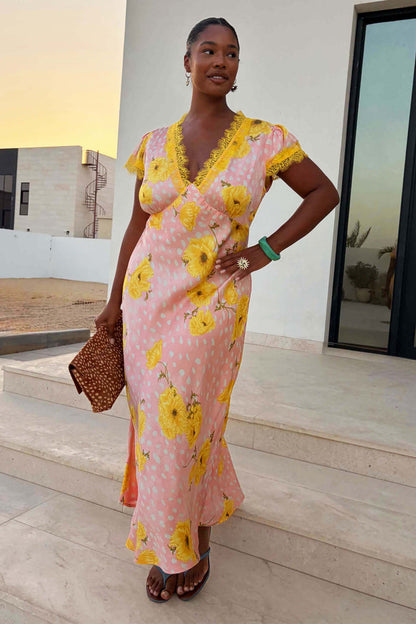 Pink Fawn Poppy Olivia Dress featuring a fawn poppy print and yellow lace trim at the neckline.