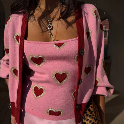 Pink Hearts Knit Tank and matching cardigan with red heart prints on a pink base, gold necklaces and leopard print.