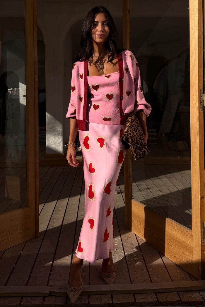 Pink Hearts Knit Tank and matching cardigan, styled with the red heart Dorris skirt and a leopard clutch.