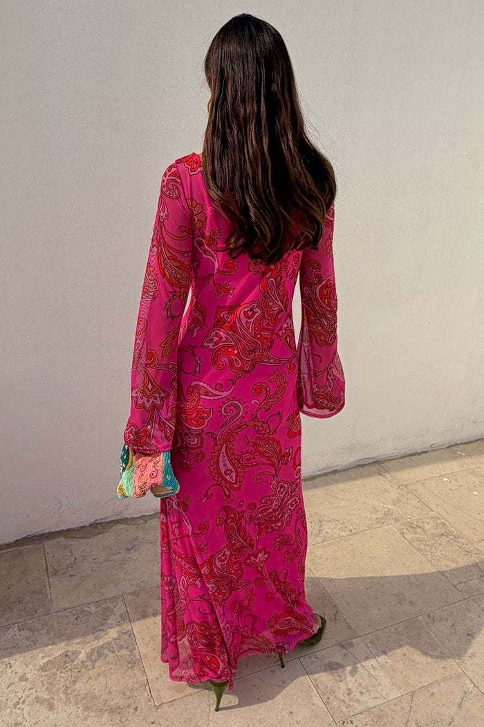 Pink Paisley Mesh Midaxi Dress with long sleeves, designed in London and shown from the back.
