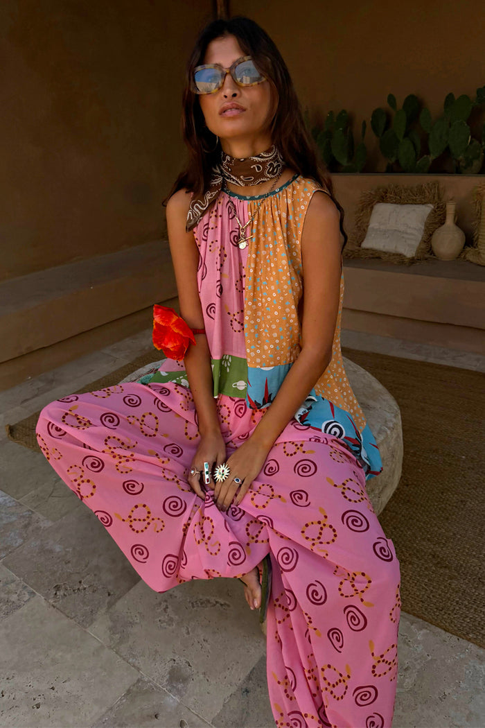 Pink Snake Balloon Trouser with dusky pink snake and swirl motifs in a balloon silhouette.