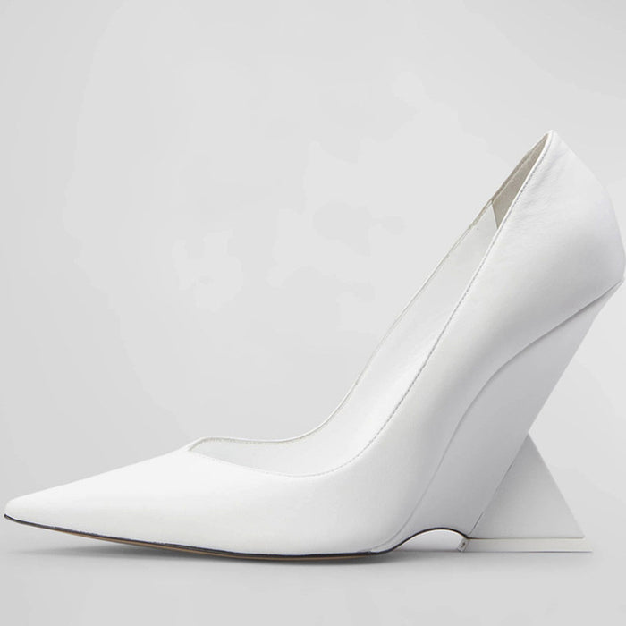 pointed-toe patent pumps with sculpted geometric heel – RUBY