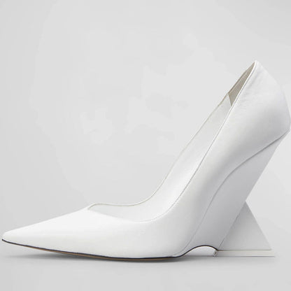 pointed-toe patent pumps with sculpted geometric heel – RUBY