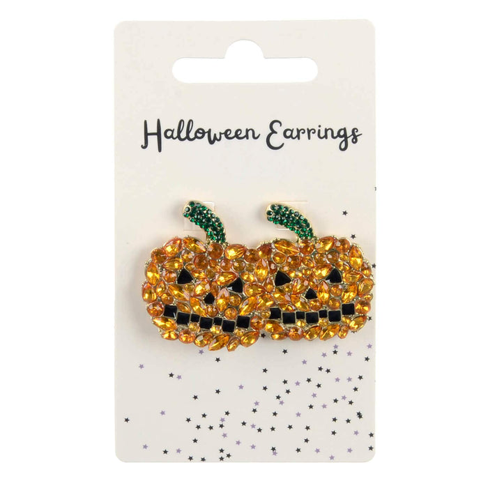 Halloween earrings shaped like jack-o'-lanterns with orange rhinestones sparkling on a branded card.