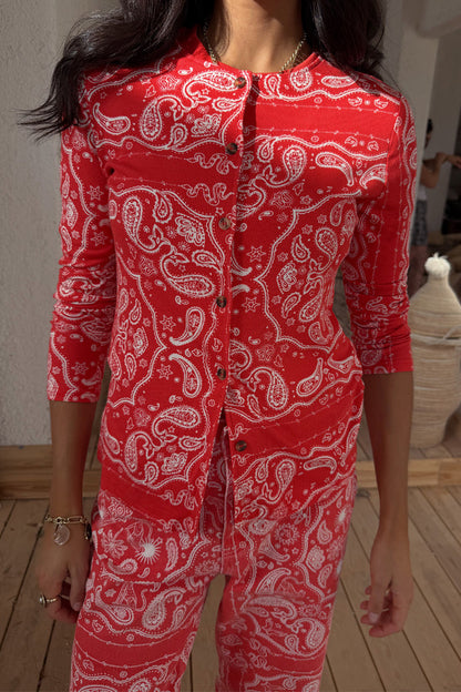 Red Bandana Alexa Cardigan in a ribbed fabric with white paisley print and front button fastening.