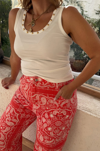 Red Bandana Jeans featuring a white bandana print and a studded tank top for inclusive sizing.