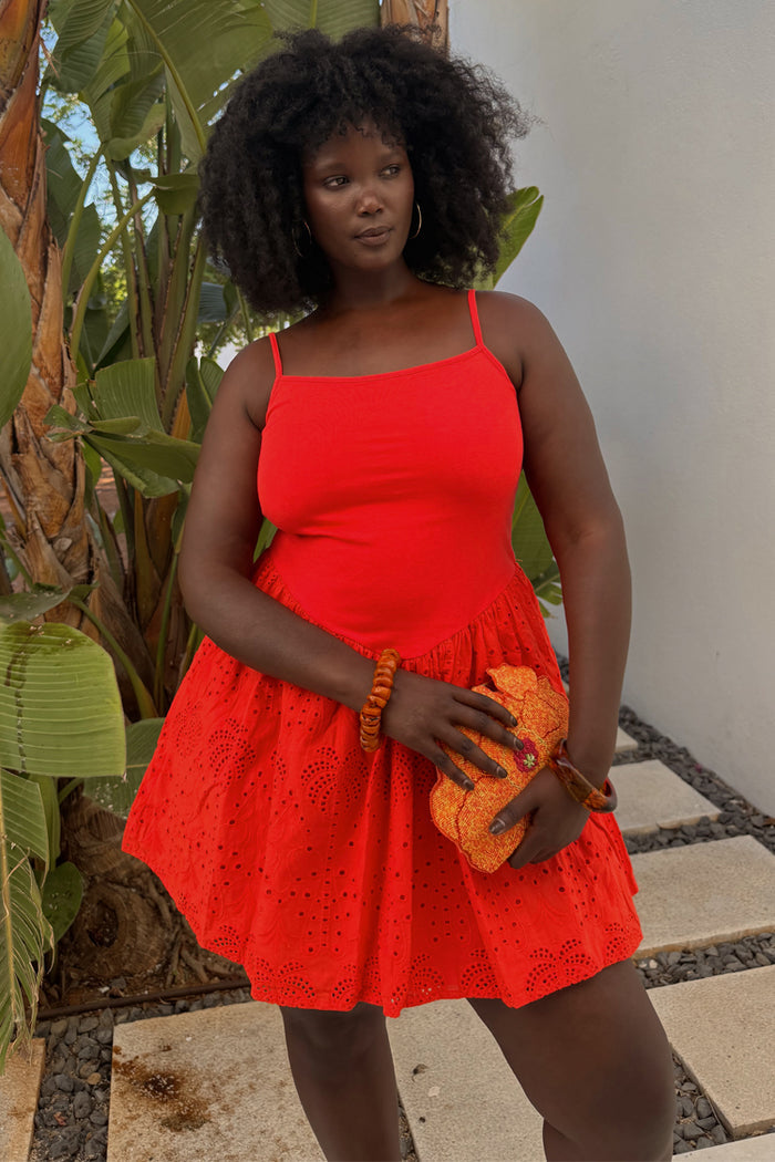 Red Broderie Mini Lola Dress in cotton with thin straps and palm-patterned broderie details.