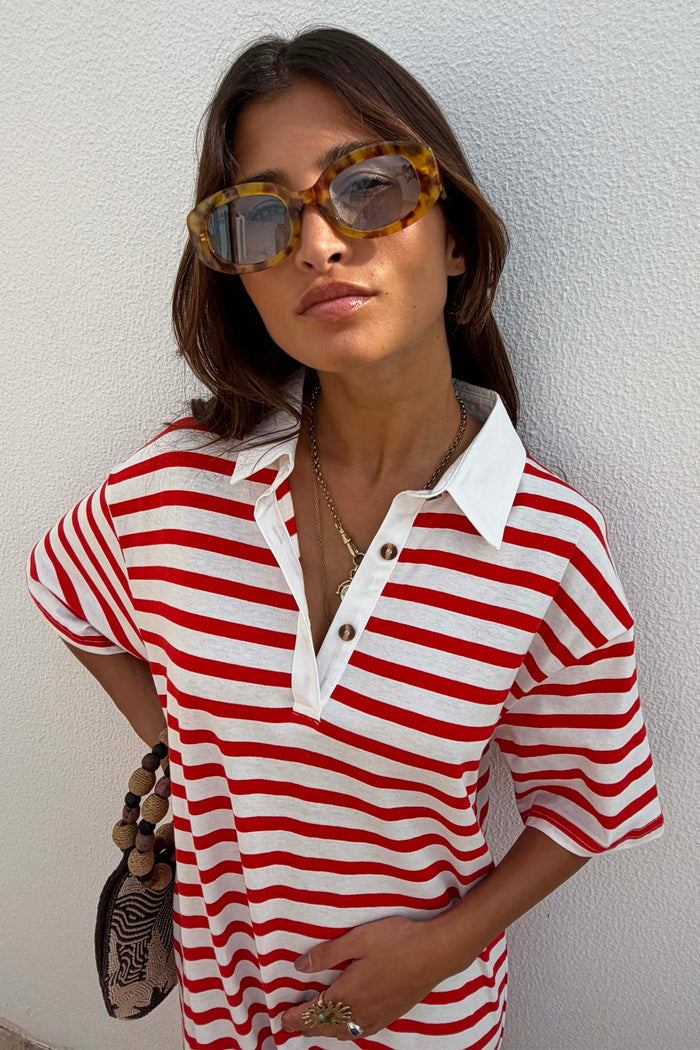 Red Stripe Jersey Dress featuring a white buttoned collar and horizontal red and white stripes, designed in London.