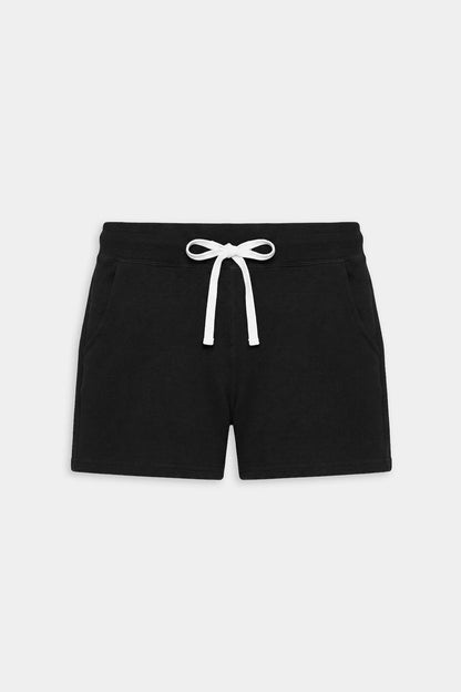 The SPLITS59 Reena Fleece Sweatshort in black features an elastic waistband, white drawstring, and side pockets, crafted from ultra luxe fleece—ideal for workouts. Shown on a plain white background.