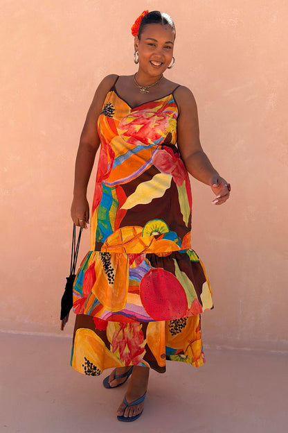 Rio Laragh midaxi dress in cotton-linen with a papaya and citrus print and tiered hem for inclusive sizing.