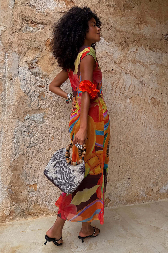 Rio Mesh Dress featuring a fruit print and cap sleeves, crafted from stretch mesh in a midi length.