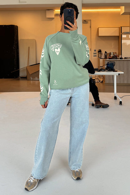 Sage Sundazed Accessible Sweatshirt in green with cream palm prints and concealed zips for medical treatment access.