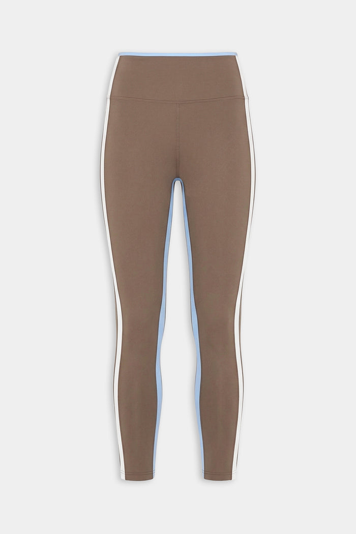 The SPLITS59 Sam High Waist Rigor 7/8 leggings in Lentil/White feature a compressive fit with white and light blue side panels, displayed on a plain white background.