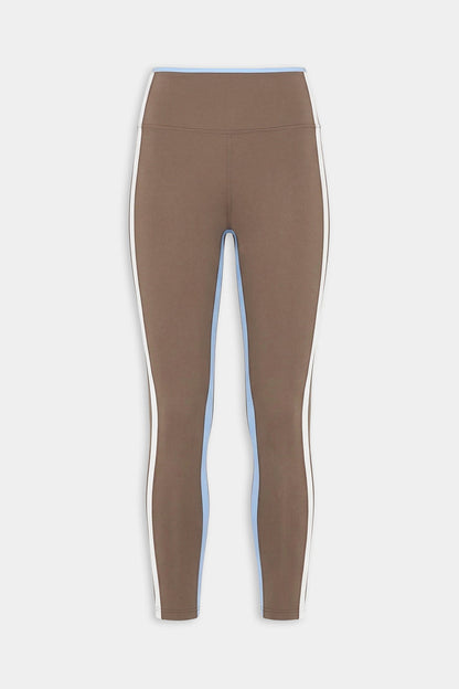 The SPLITS59 Sam High Waist Rigor 7/8 leggings in Lentil/White feature a compressive fit with white and light blue side panels, displayed on a plain white background.