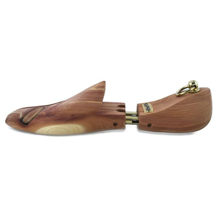 A pair of red aromatic cedar wood shoe trees with brass fittings, designed to be inserted into shoes to maintain their shape.