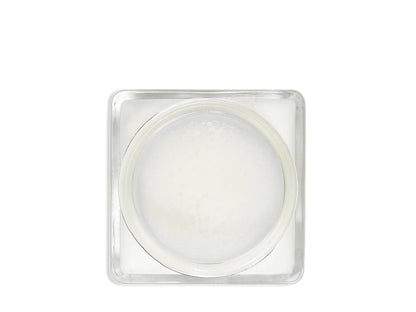 A glass jar 'SAPHIR' containing cream shoe polish.