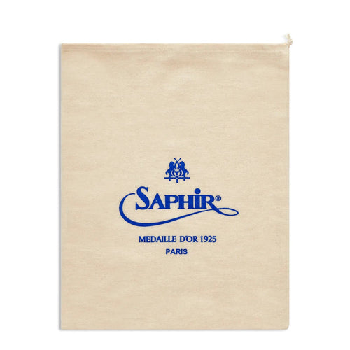 A beige cotton shoe bag with the Saphir Medaille d'Or logo printed in blue.