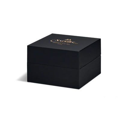 A black velvet-lined box with the Saphir Medaille D'Or logo on the lid.