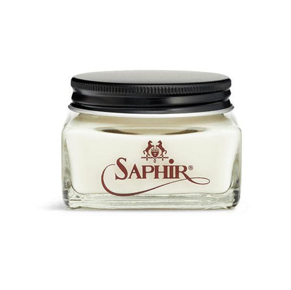 A glass jar with a black lid containing Saphir Medaille D'Or oiled leather cream, branded with the Saphir logo in gold lettering on a black label.