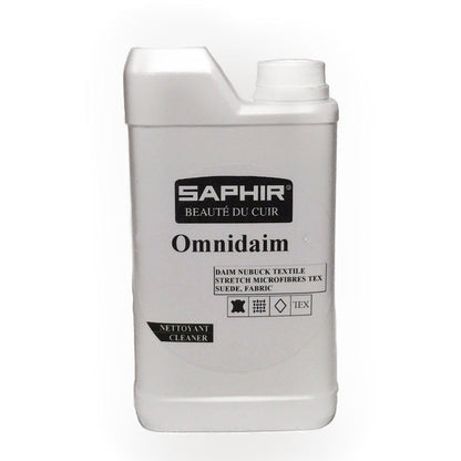 A product image featuring a plastic bottle of Saphir Omnidaim Suede Multicleaner