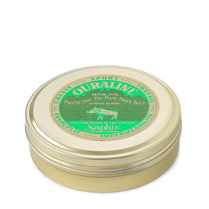 A round tin container with a lid, labeled 'Saphir Ouraline' which is special grease for leather goods.