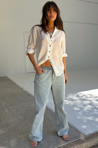 Blue Scallop Detail Straight Leg Jeans in structured denim paired with a white button-down shirt.
