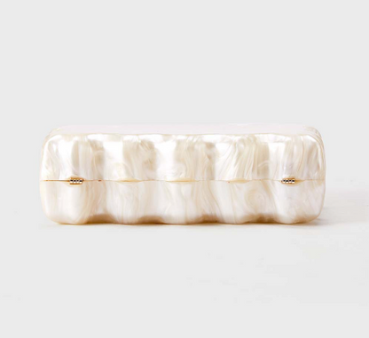 sculpted pearl-effect clutch with wave edges – ELYSIA