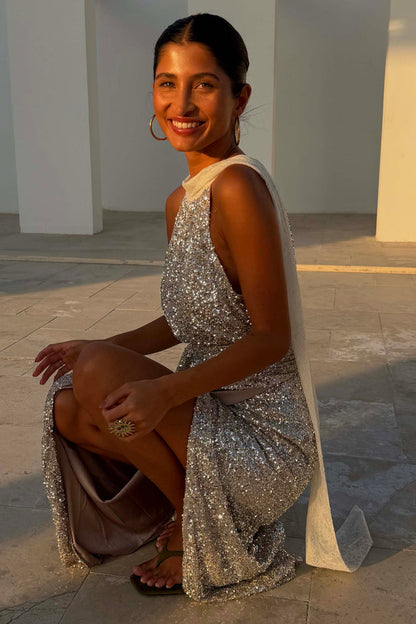Silver Sequin Lily Top with white lace tie-neck fastenings, styled as a multi-wear piece with a matching skirt.