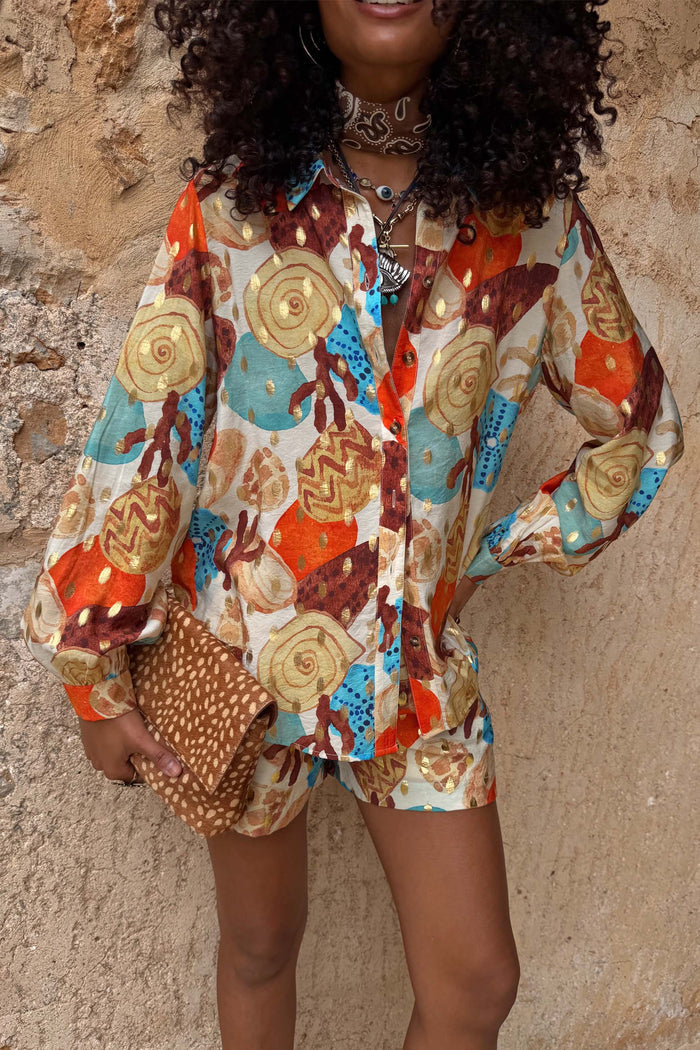 Shell Marley Shirt featuring a multi-colour abstract shell print and metallic detailing, styled as a co-ord.