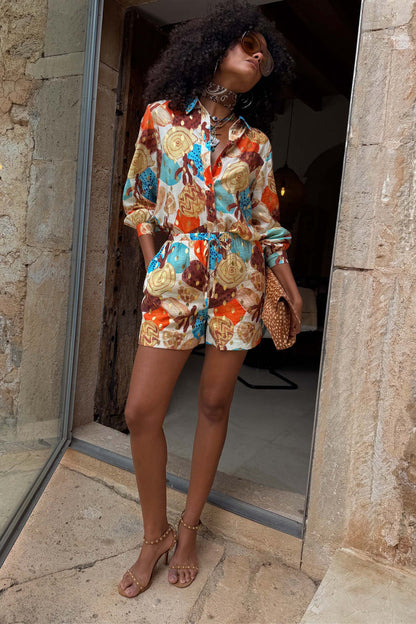 Shell Marley Shirt with a multi abstract shell print and metallic detailing, styled as a co-ord with matching shorts.