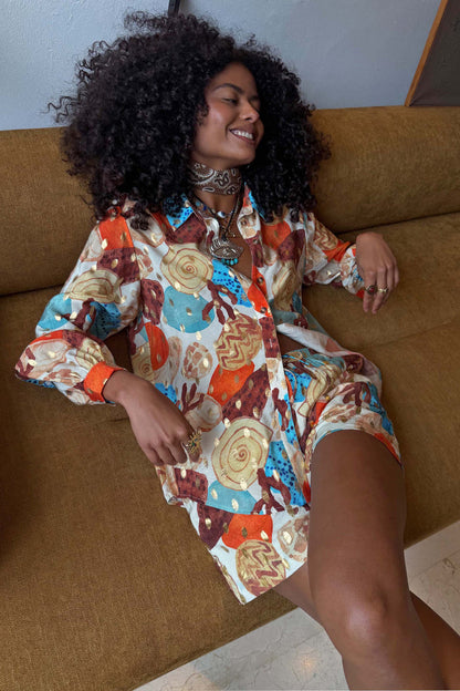 Shell Marley Shirt in a multi-colour abstract shell print with metallic flecks, styled as a multi-wear co-ord.