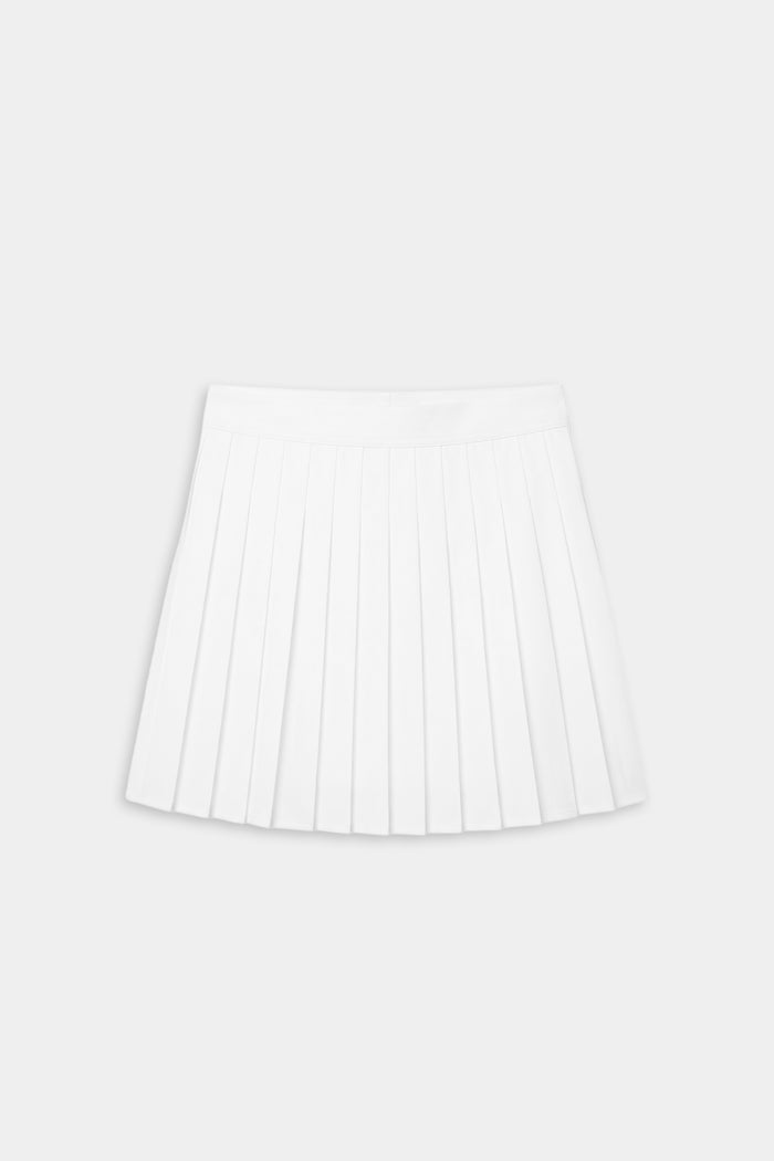 The SPLITS59 Shira Woven Pleated Skort in white is displayed flat on a light gray background, ideal for court sports or high-impact workouts.
