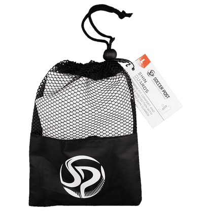 Soccer Post shin guards in a black mesh drawstring bag with a white "SP" logo on the front and a retail tag attached.