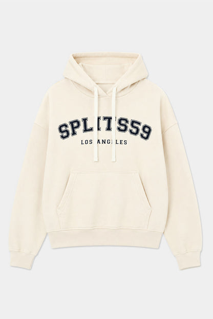 The Stella French Terry Oversized Hoodie in Creme by SPLITS59 is crafted from 100% cotton and features “SPLITS59 LOS ANGELES” printed in black and white lettering on the front, along with a front pocket and adjustable drawstrings.