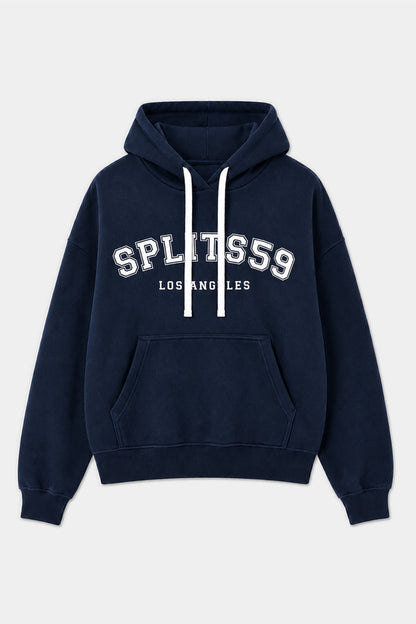 The Stella French Terry Oversized Hoodie by SPLITS59 features an indigo color, is crafted from 100% cotton, and includes white drawstrings, a kangaroo pocket, and “SPLITS59 LOS ANGELES” printed in white on the front.