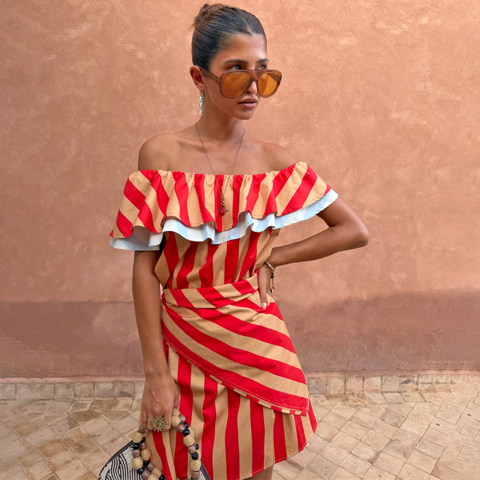 Tomato Stripe Scarf in red and tan stripes styled as a multi-wear off-the-shoulder top.