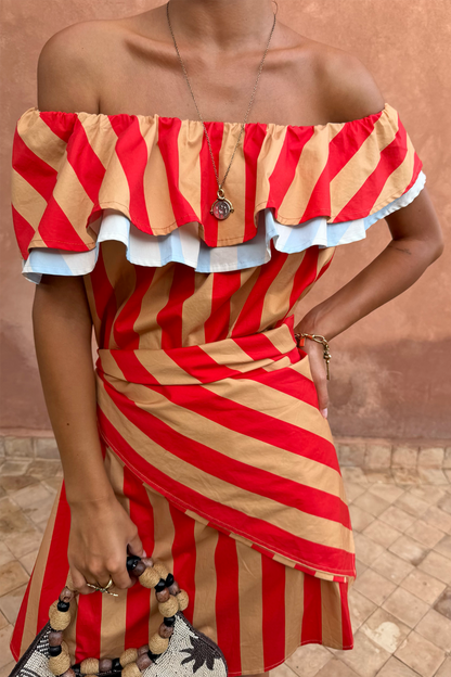 Tomato Stripe Scarf in red and tan, styled as a multi-wear waist wrap over a matching off-the-shoulder dress.