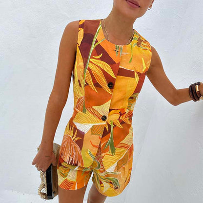 Verano Tate Shorts and co-ord waistcoat featuring an orange tropical palm and sun print in a cotton-linen blend.