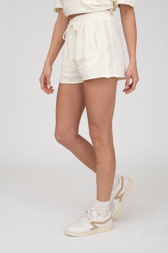 WASHED FRONT TIE RAW EDGE MINI SHORTS
