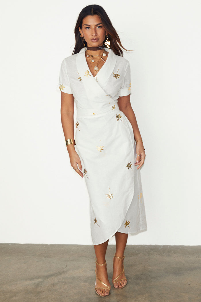 White cotton linen Brooklyn wrap dress with metallic gold palm flecks and a wraparound collar.