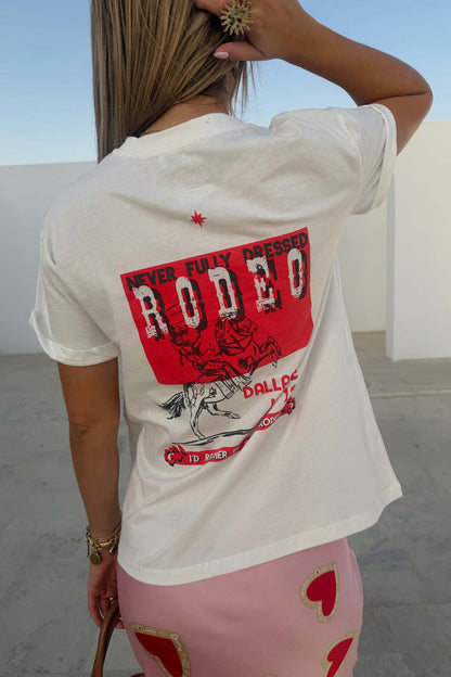 White cotton Rodeo T-Shirt featuring a bold red graphic on the back and a boxy fit.