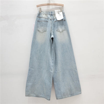 wide-leg denim pants with oversized organza floral appliqué – BLOSSOM