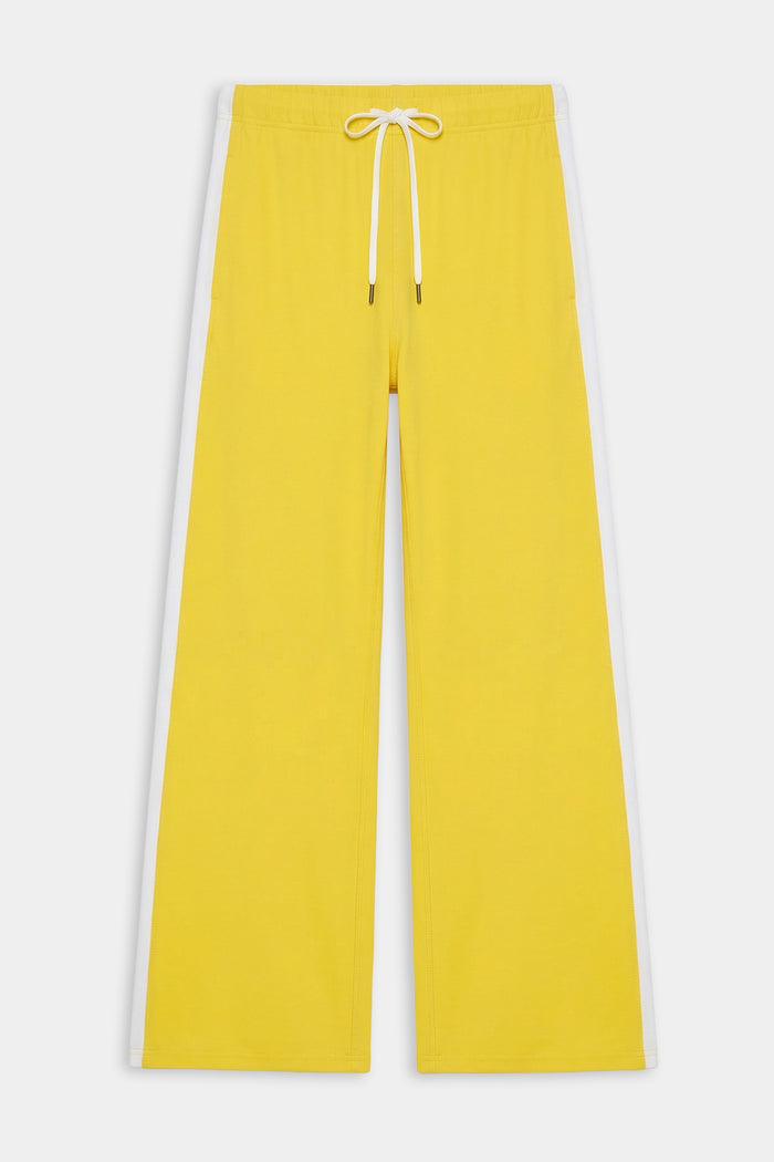 The SPLITS59 Willow Airweight Wide Leg pants in Bright Yellow/White feature buttery-soft fabric, a white drawstring waist, and crisp white side stripes, shown flat against a white background.
